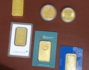 four gold bars two gold coins